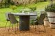 The Petra round dining table and Corsica scoop dining chairs
