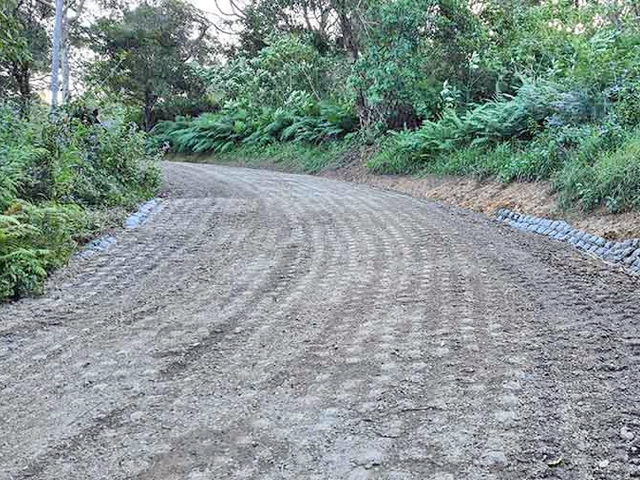 Resurfaced Sloped Gravel Driveway