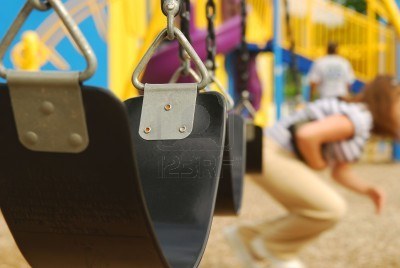 5699474-a-close-up-of-an-empty-swing-at-the-playground-focus-on-swing-shallow-depth-of-field