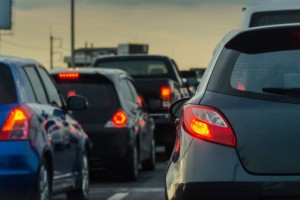 traffic jam with row of cars on expressway during rush hour