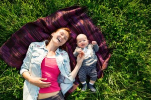 Baby and mother on nature in the park