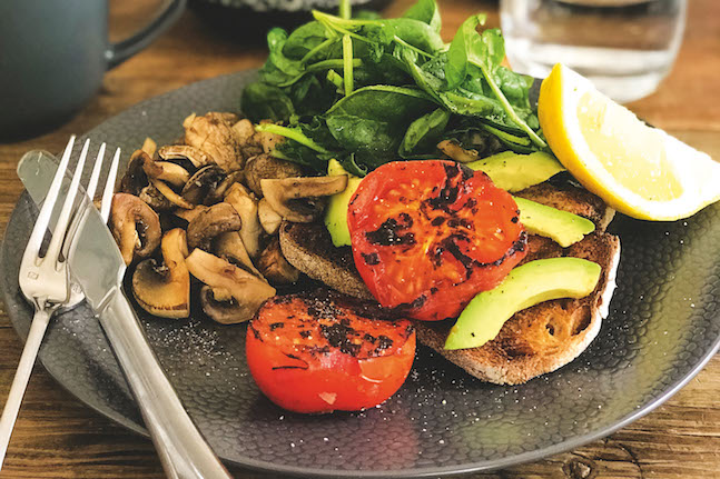 Mushroom, Tomato, Avocado And Greens On Sourdough Toast